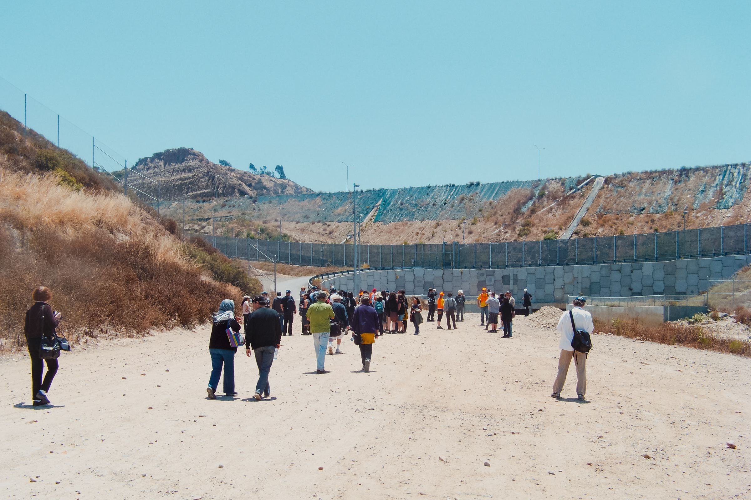 2 of 6, people near concrete structure